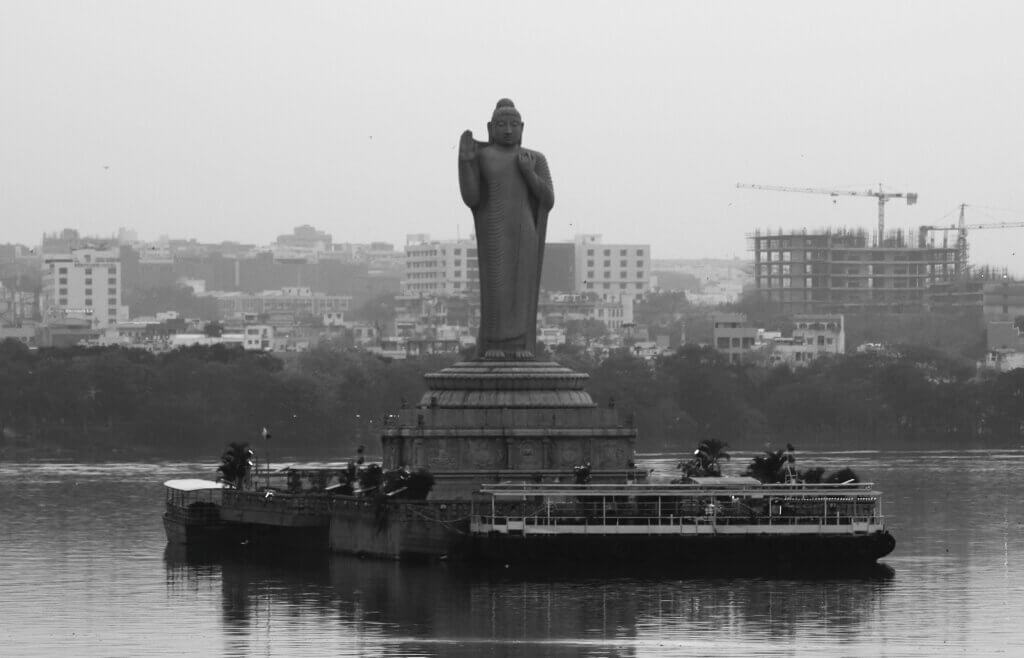 A necklace road sunrise, lake and Buddha statue